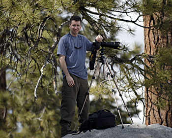 Scott takes his photo gear everywhere. Here, you can see the photo backpack doesn't stop him from hitting the slopes.